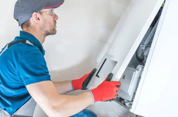Technician-working-on-furnace